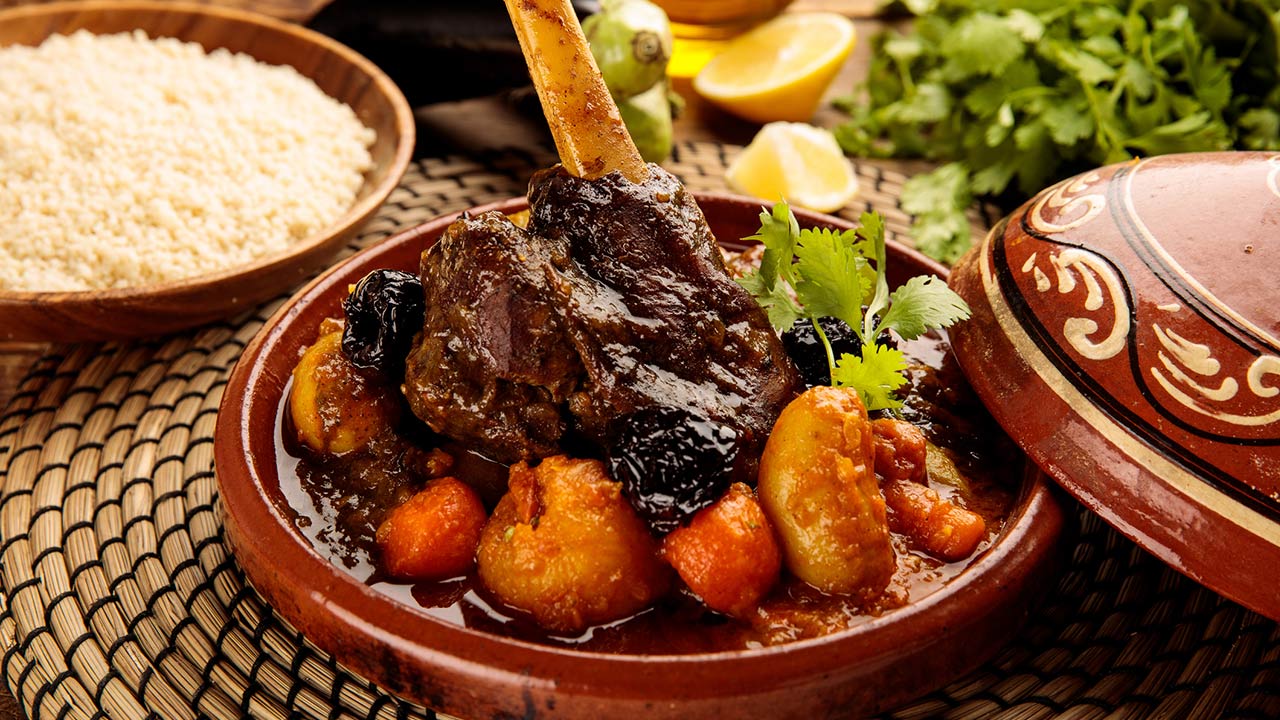 moroccan lamb and Vegetables with bread served in a dish