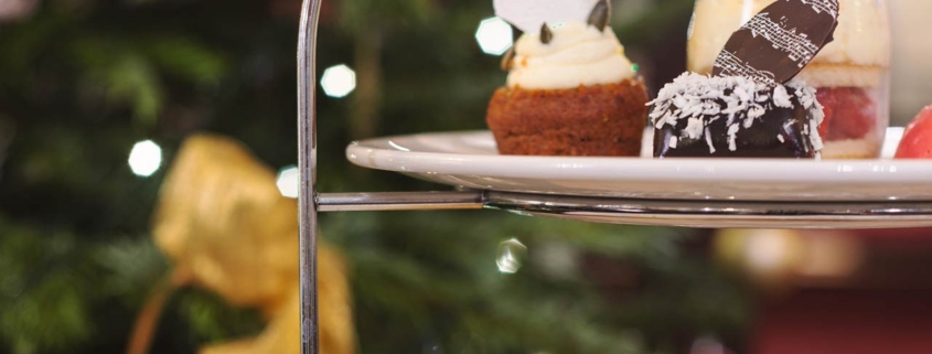 Festive afternoon tea with sandwiches, scones and puddings