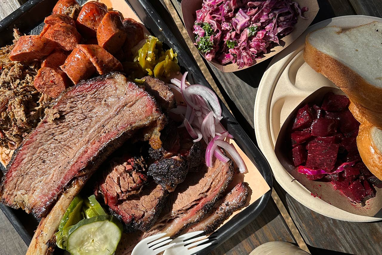 An overhead view of a large tray of Texas barbecue foods